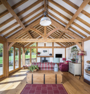 Open plan living with exposed beams