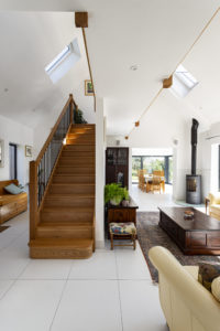 White hallway with stairs