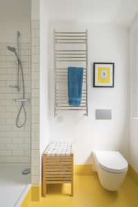 Bathroom with yellow floor