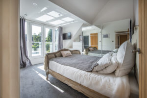 Bedroom with skylights