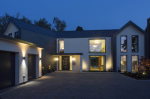 House at dusk with driveway