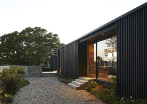 Black clad house with stairs