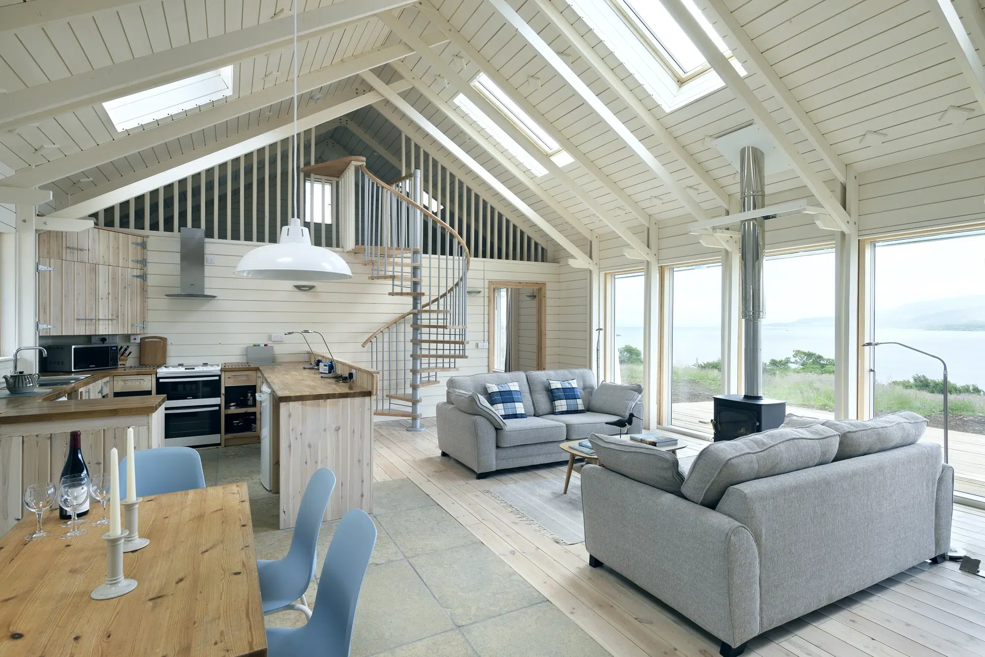 White living room with skylights