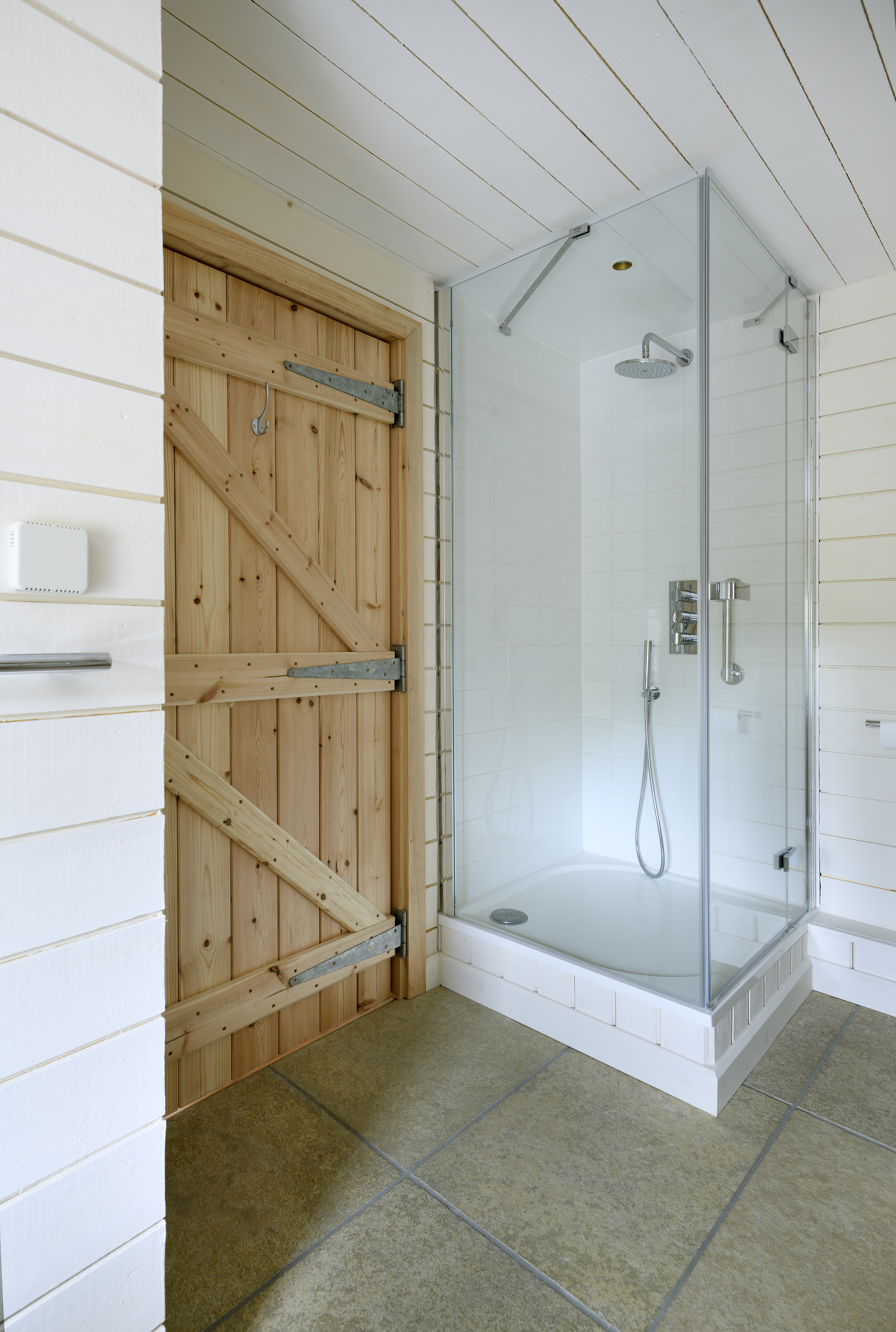 Shower room with wooden door