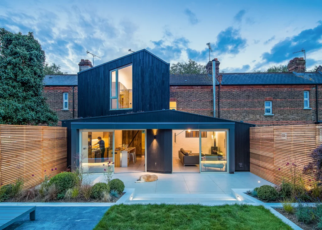 home extension with timber-clad exterior and angular roofline