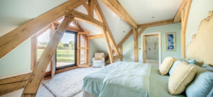 Exposed beam bedroom