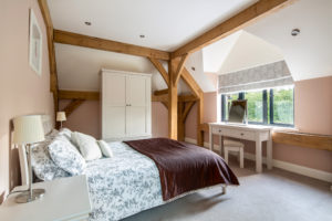 Bedroom with exposed beams