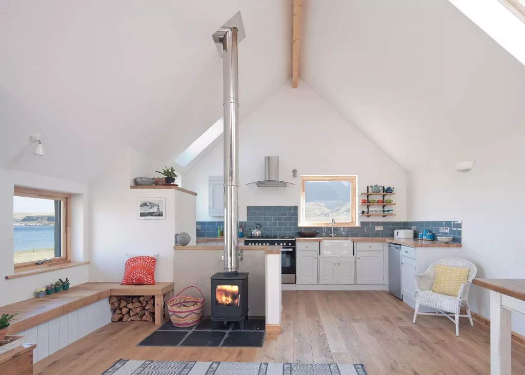 small kitchen with vaulted ceiling in an affordable self build home