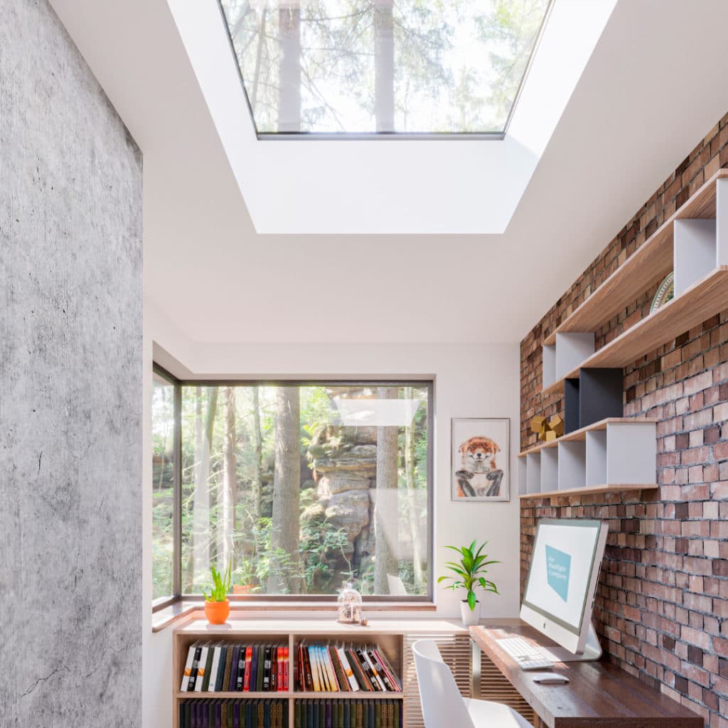 Home office with overhead glazing by The Rooflight Company