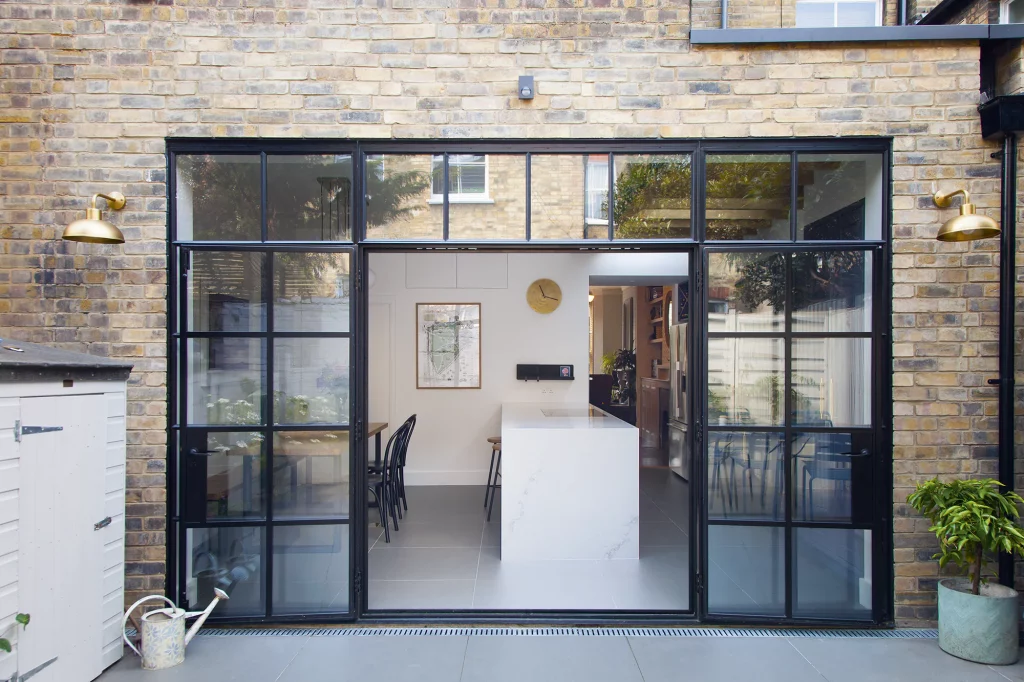 Extension with French doors by George and James Architecture