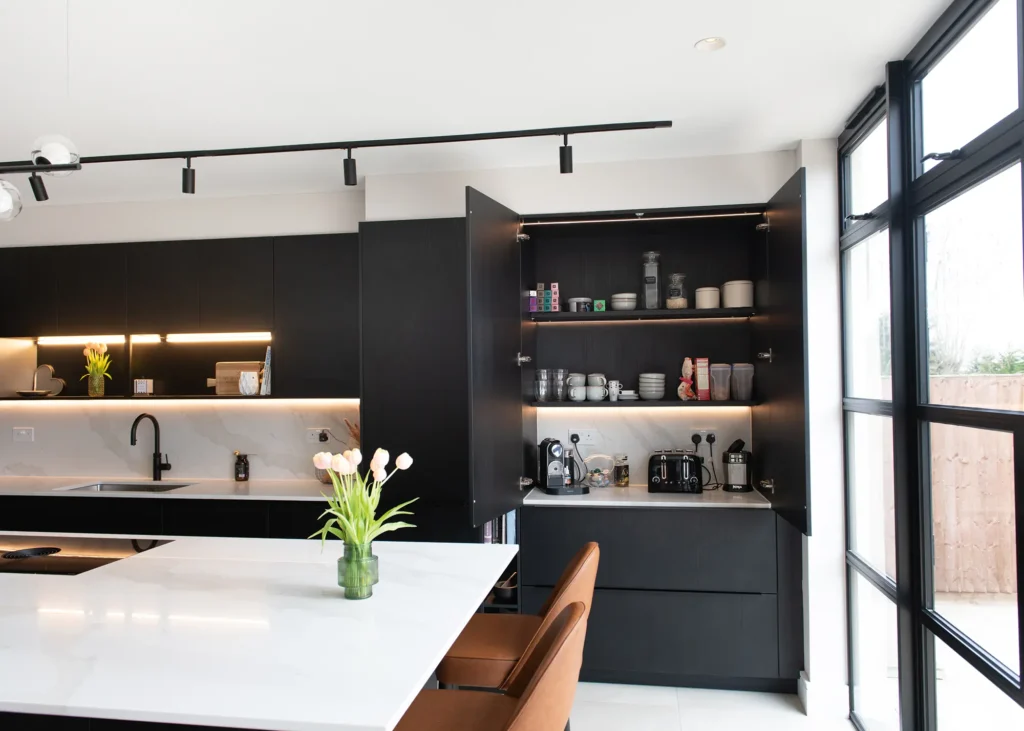 kitchen design with integrated storage cupboards