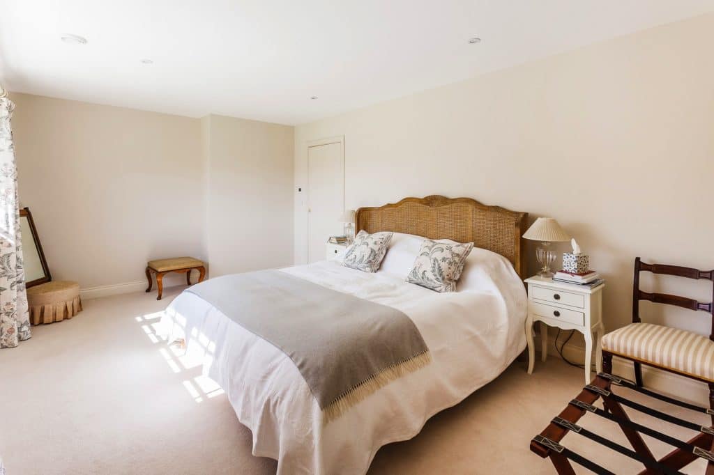 Cosy master bedroom with timber casement windows