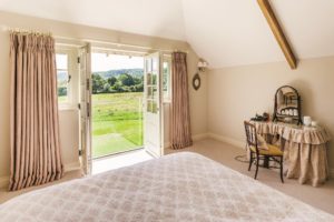 Light-filled bedroom with unobstructed views