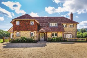 Brick-clad timber frame home