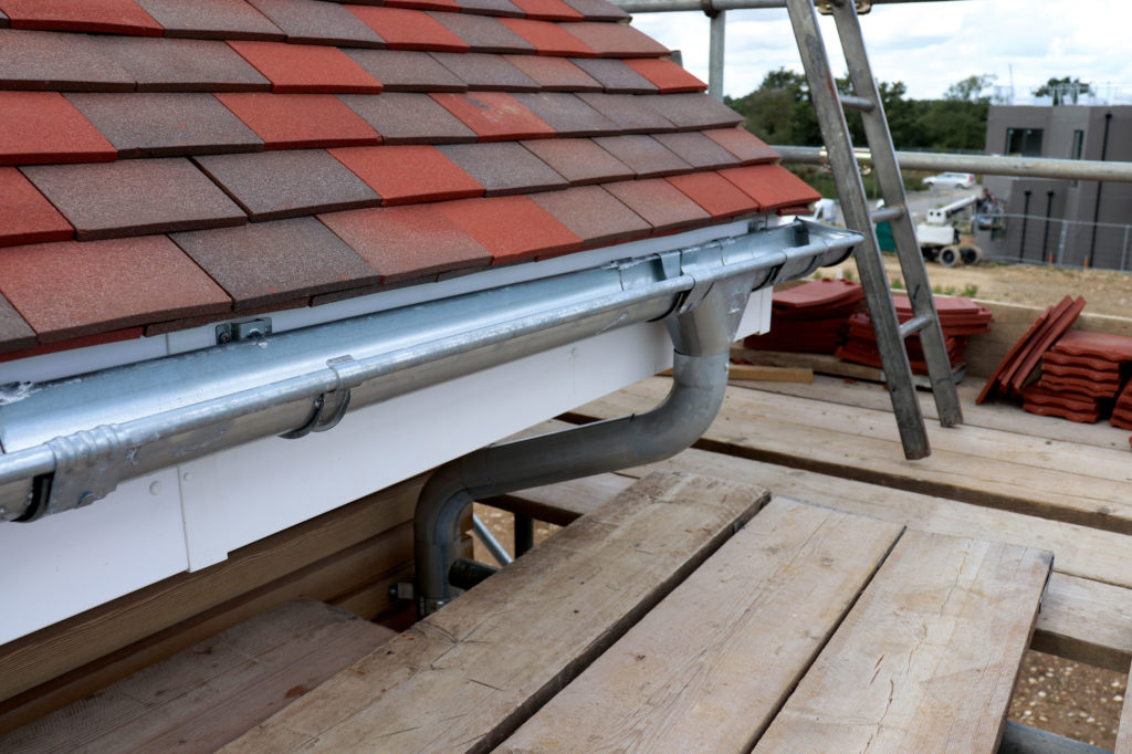 Roof tiles and guttering