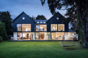 Contemporary extension to bungalow with sunflex glazed doors