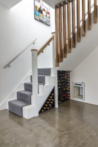 staircase with wine storage