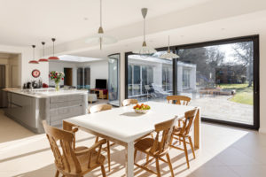 Modern kitchen with sliding glass doors