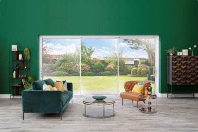 Green sitting room with patio sliding doors