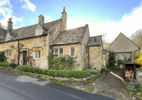 Exterior shot of Rose Cottage with a garage converted to a bathroom