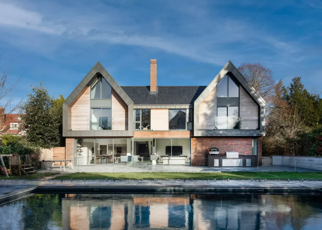 Contemporary home finished with zinc, timber and expansive glazing