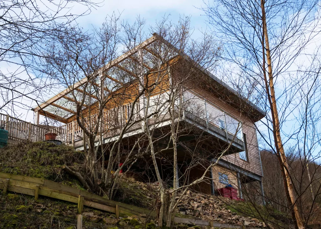 View of the home from beneath with steel frames holding the home