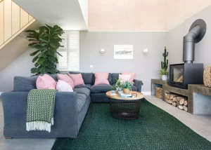 Open living room with large grey L-shaped sofa