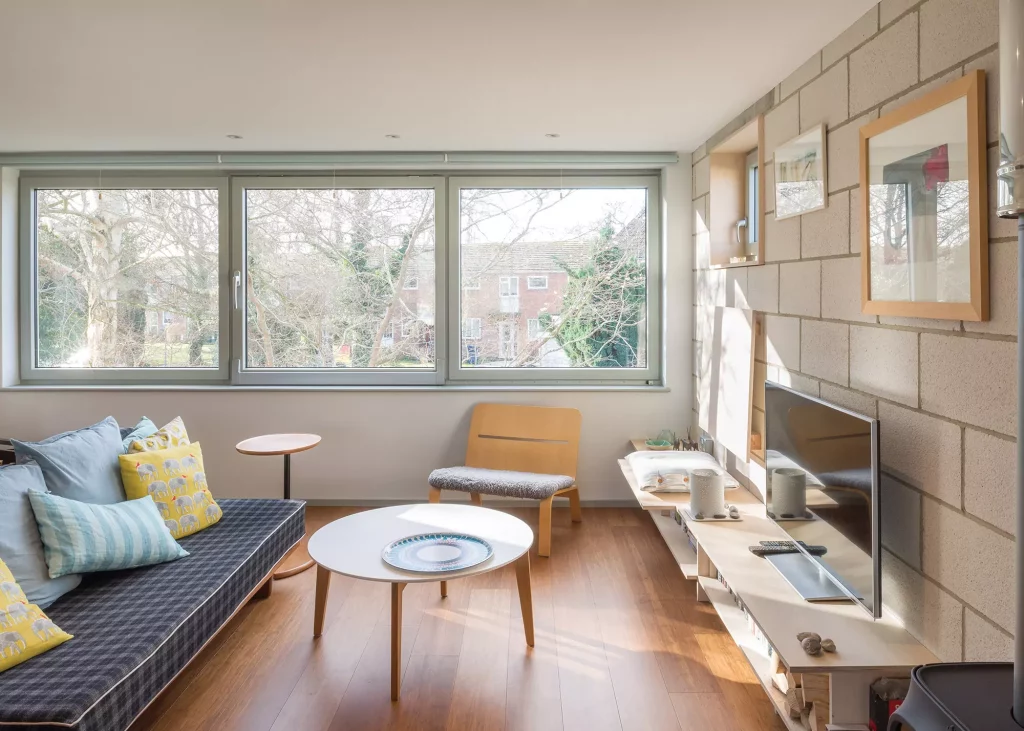 living room area with wide glazing and bamboo wood flooring