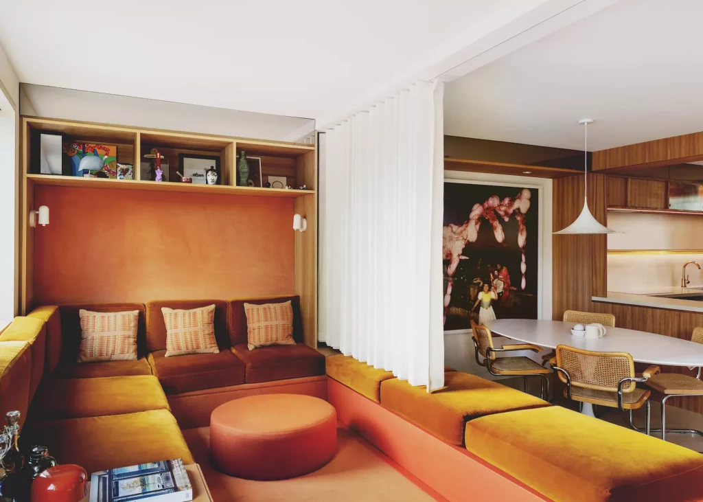 1970s inspired open plan living area with curtain partition