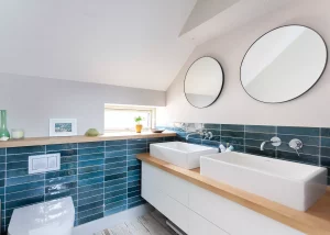 Contemporary bathroom with blue tiles and double sink
