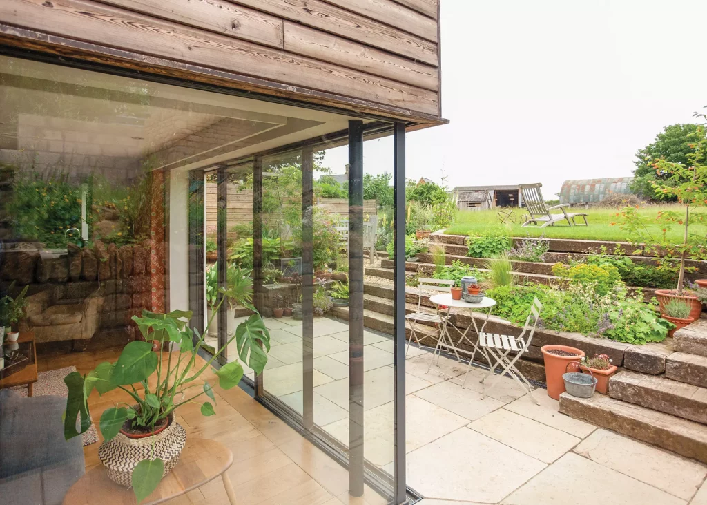 View of the raised garden from new glazed extension