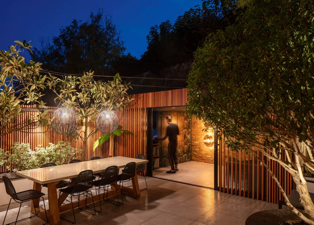 evening view of the garden room addition to the urban home