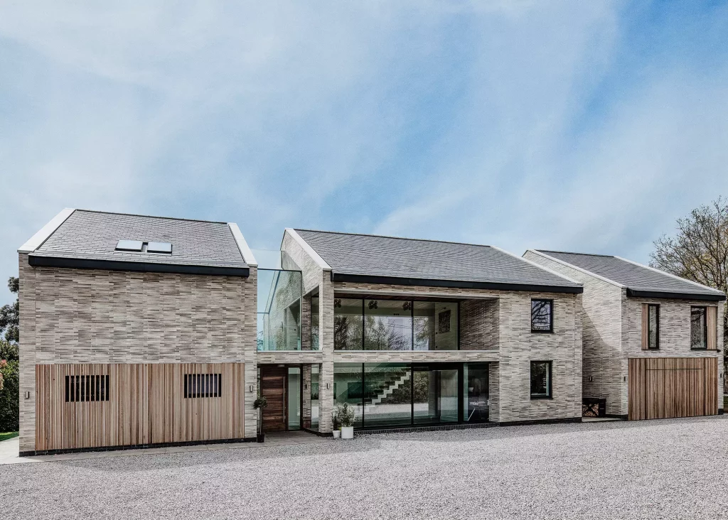 two-storey glazed link between two contemporary builds