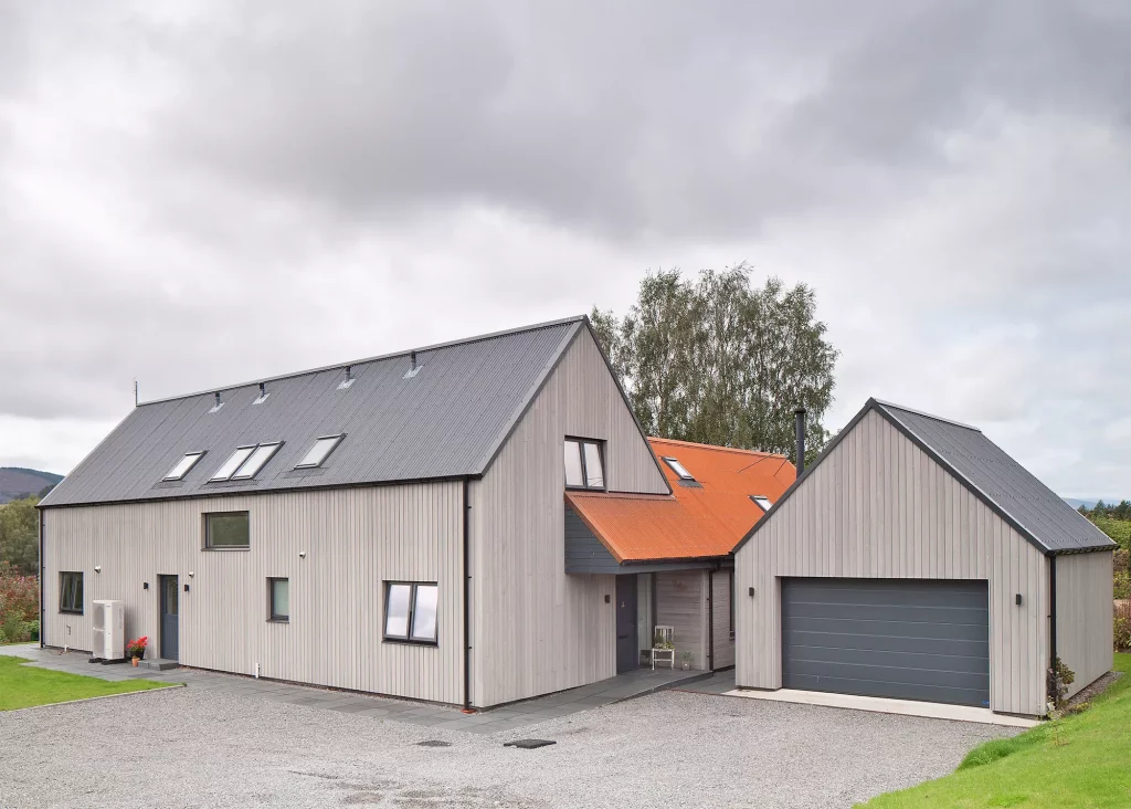 timber frame home with Siberian larch cladding and Corten roof