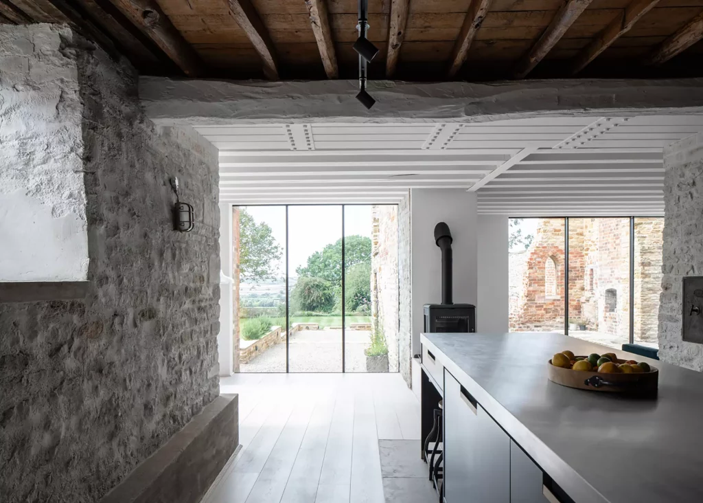 open plan kitchen interior of Listed 17th century ruins turned into contemporary extension