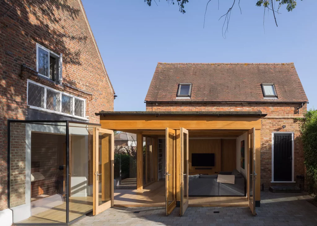 glazed link extension to a grade II listed former schoolhouse