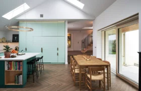 kitchen-dining-living area with rooflights and large glazed doors