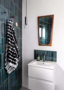 contemporary bathroom with emerald tiles