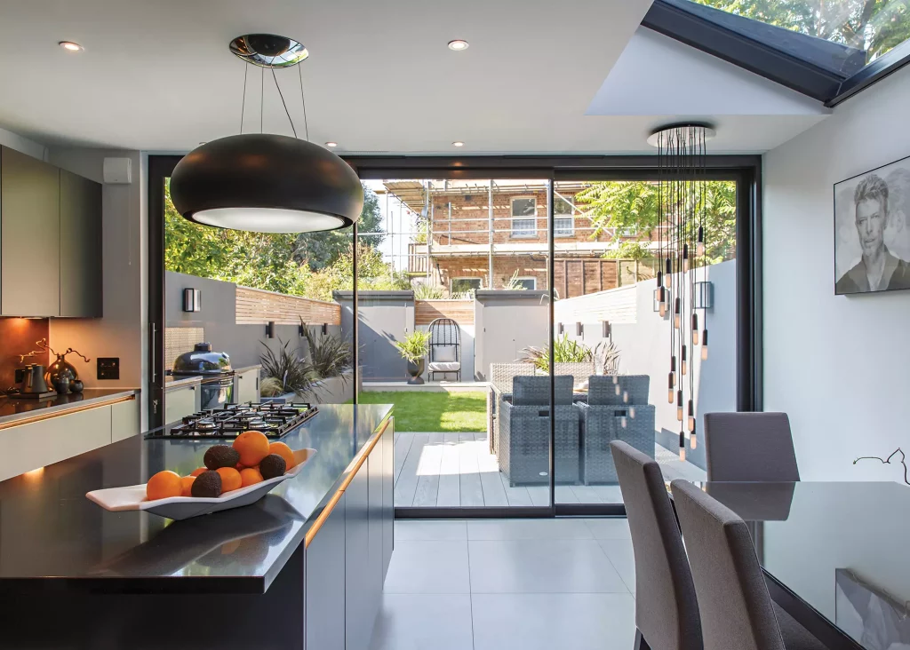 contemporary kitchen-diner side return extension with lean to glazed roof