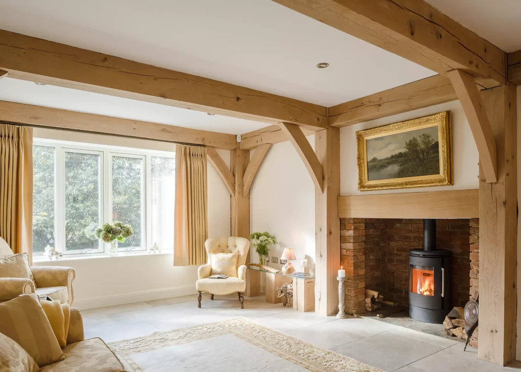 living room decorated in neutral tone and exposed oak beams