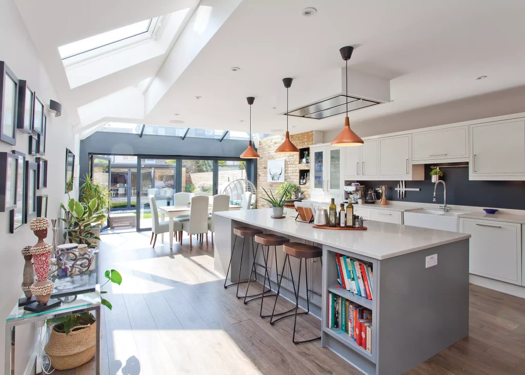 light-filled kitchen-diner extension with overhead glazing and glazed doors