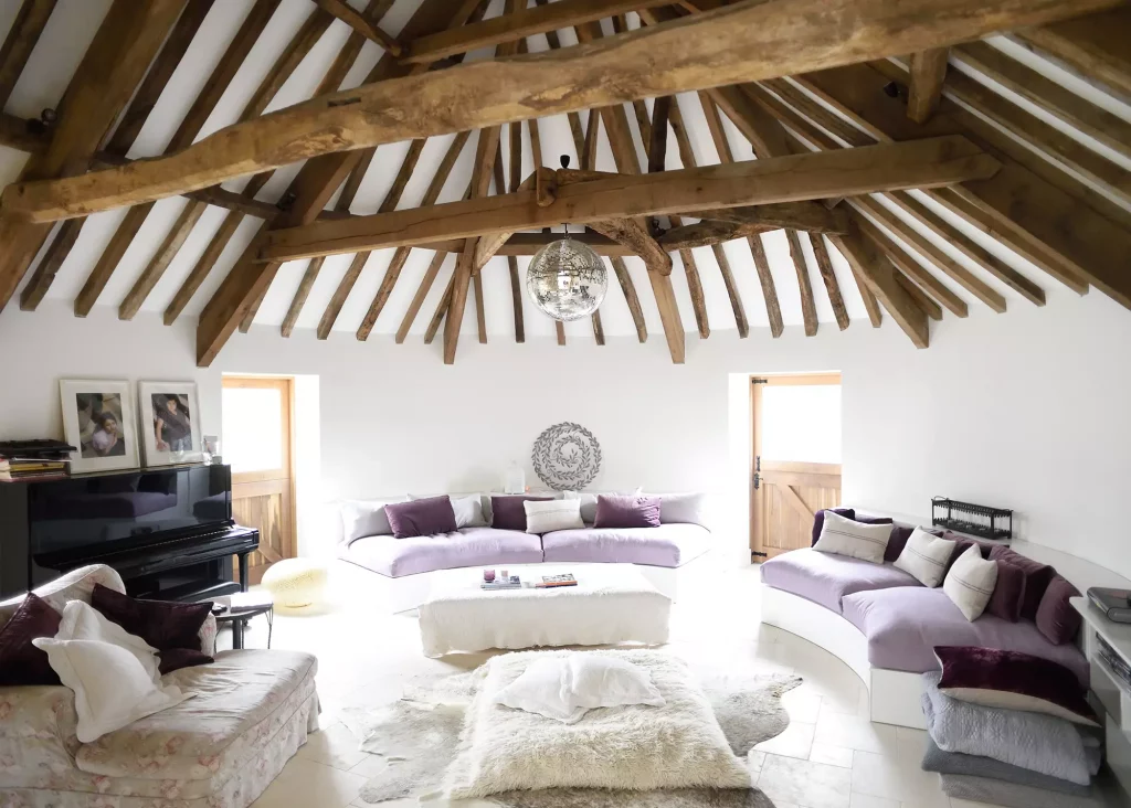 barn conversion with curved walls and exposed beams