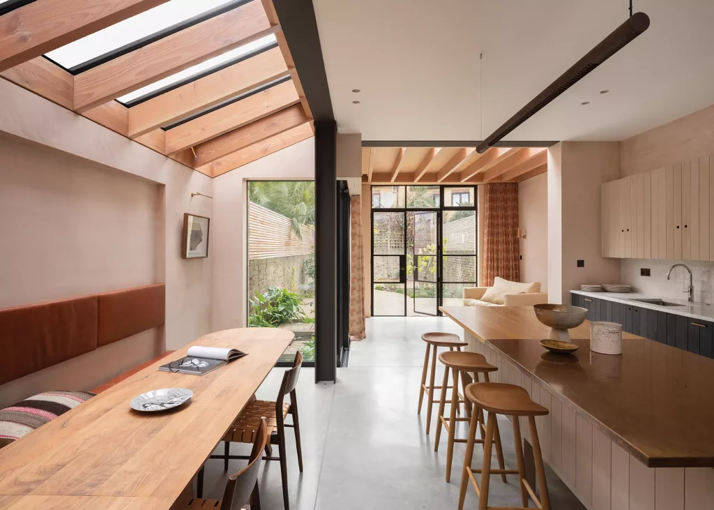 Side return extension with exposed timber and steel Interior
