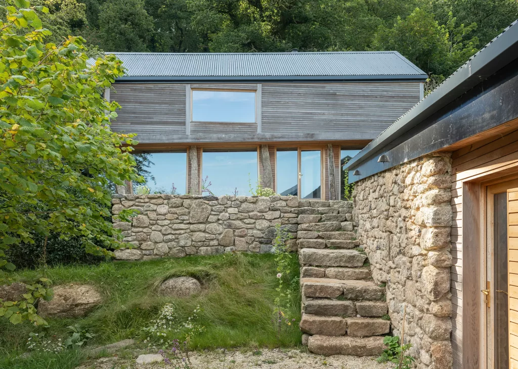 barn conversion on sloping plot