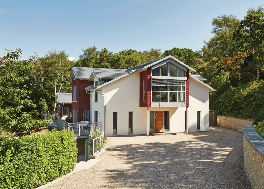 contextual prefabricated home among the trees