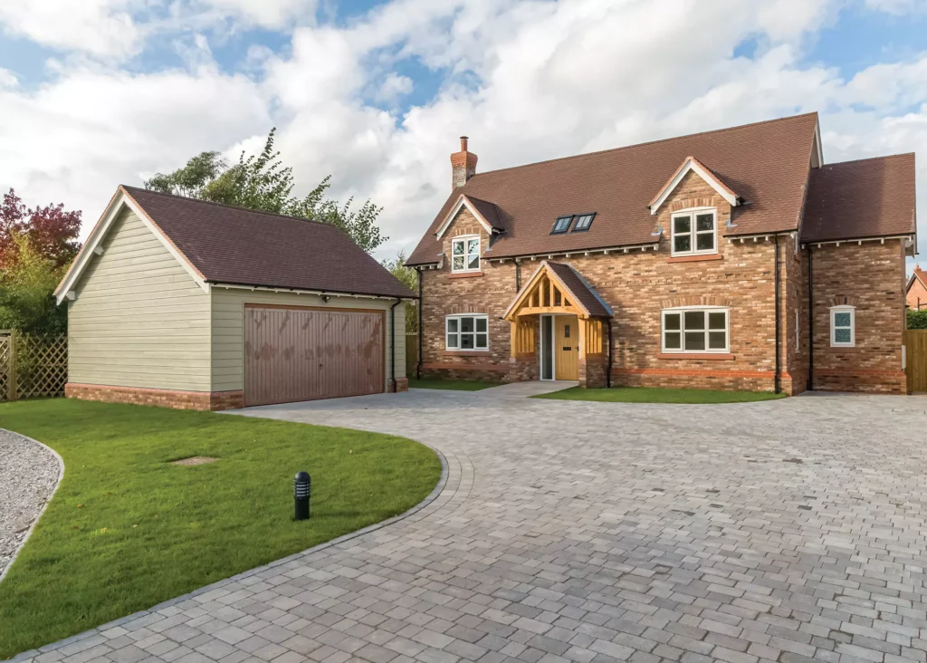 traditional style garage with cladding and pitched roof 