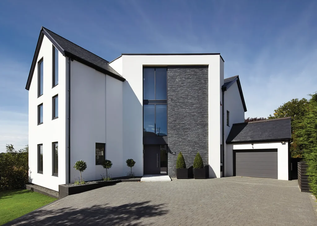 SIPs self build home with white render exterior