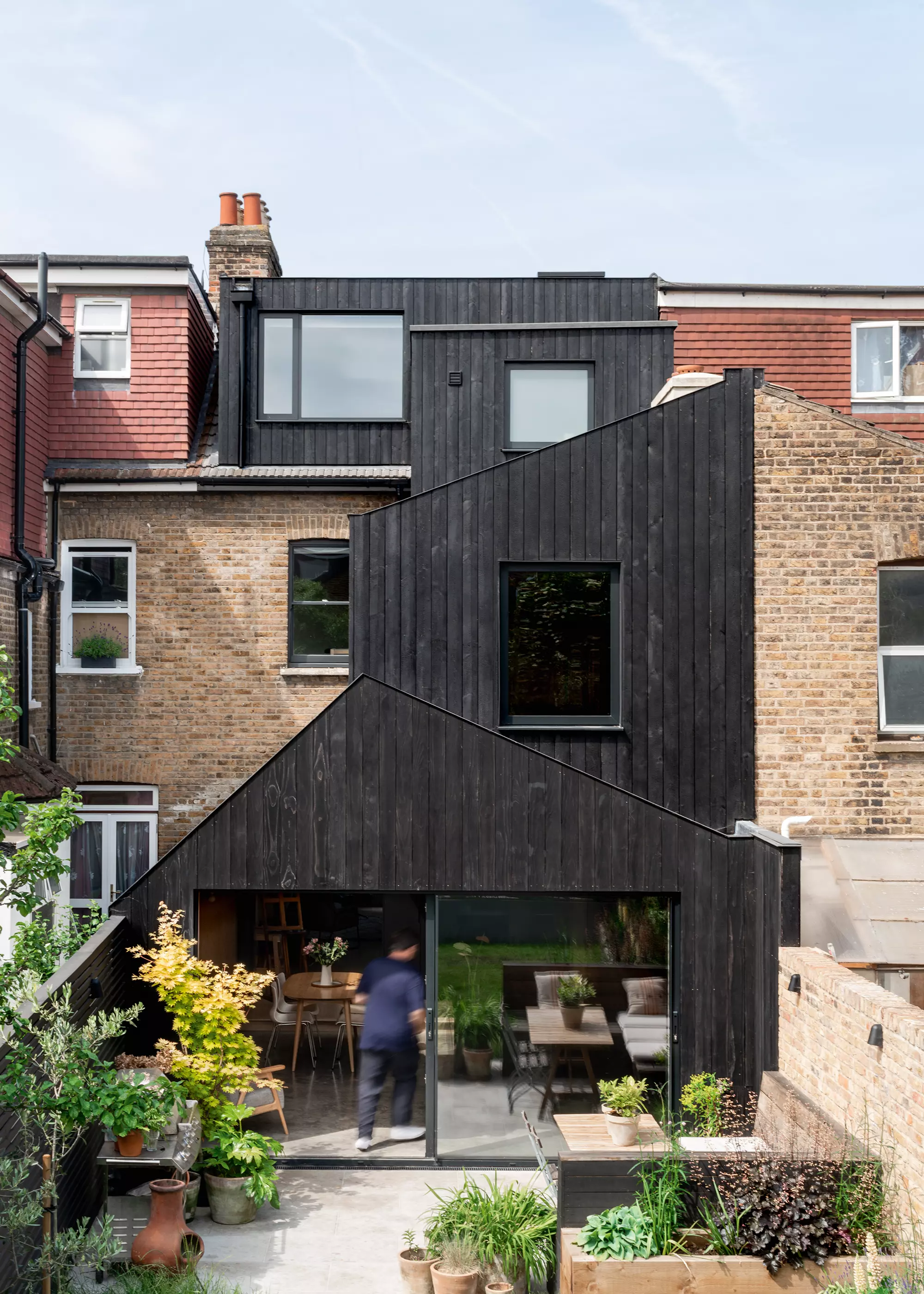 rear extension and loft conversion with blackened timber cladding finish