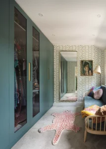 dressing room in renovated home with timber clad extension