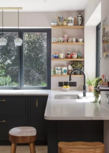 1970s home renovated and extended with a timber clad extension featuring open-plan kitchen area